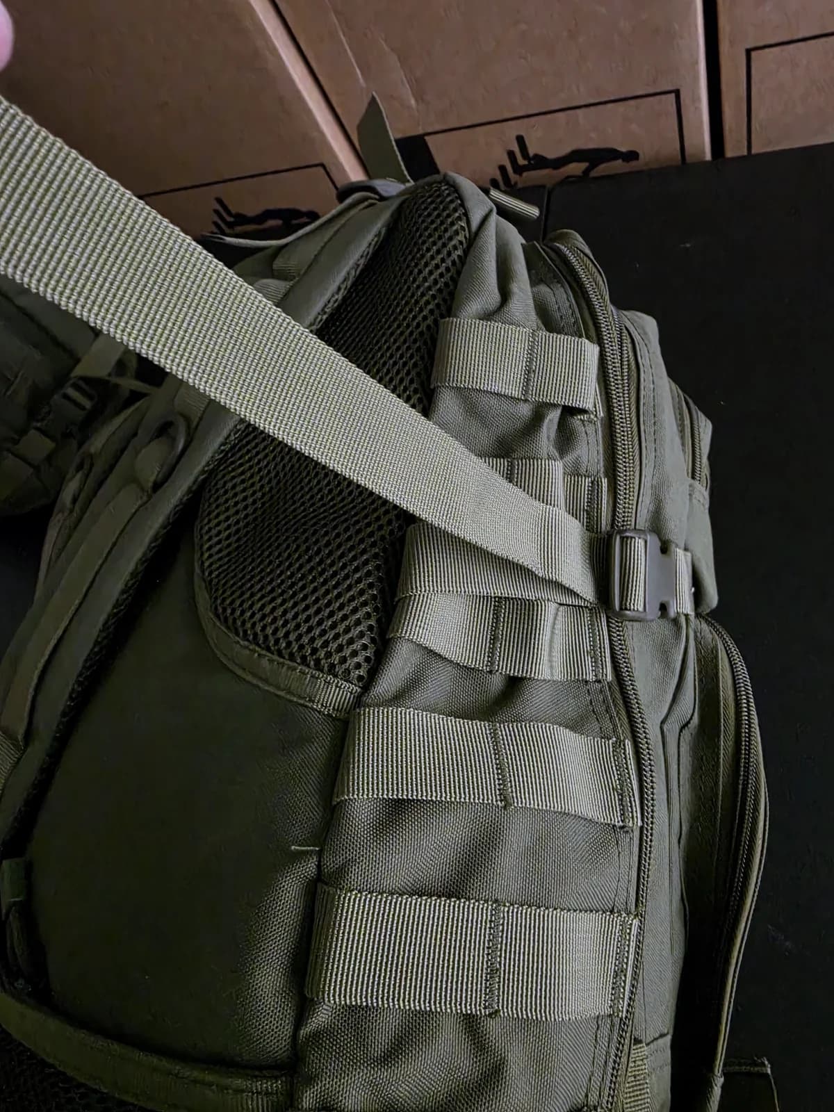 Padded mesh back panel and shoulder harness on the Outpost go-bag