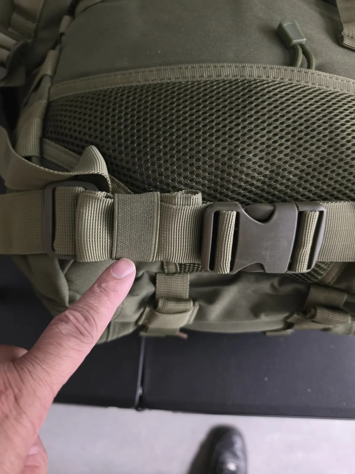 Waist belt detail on the Outpost go-bag