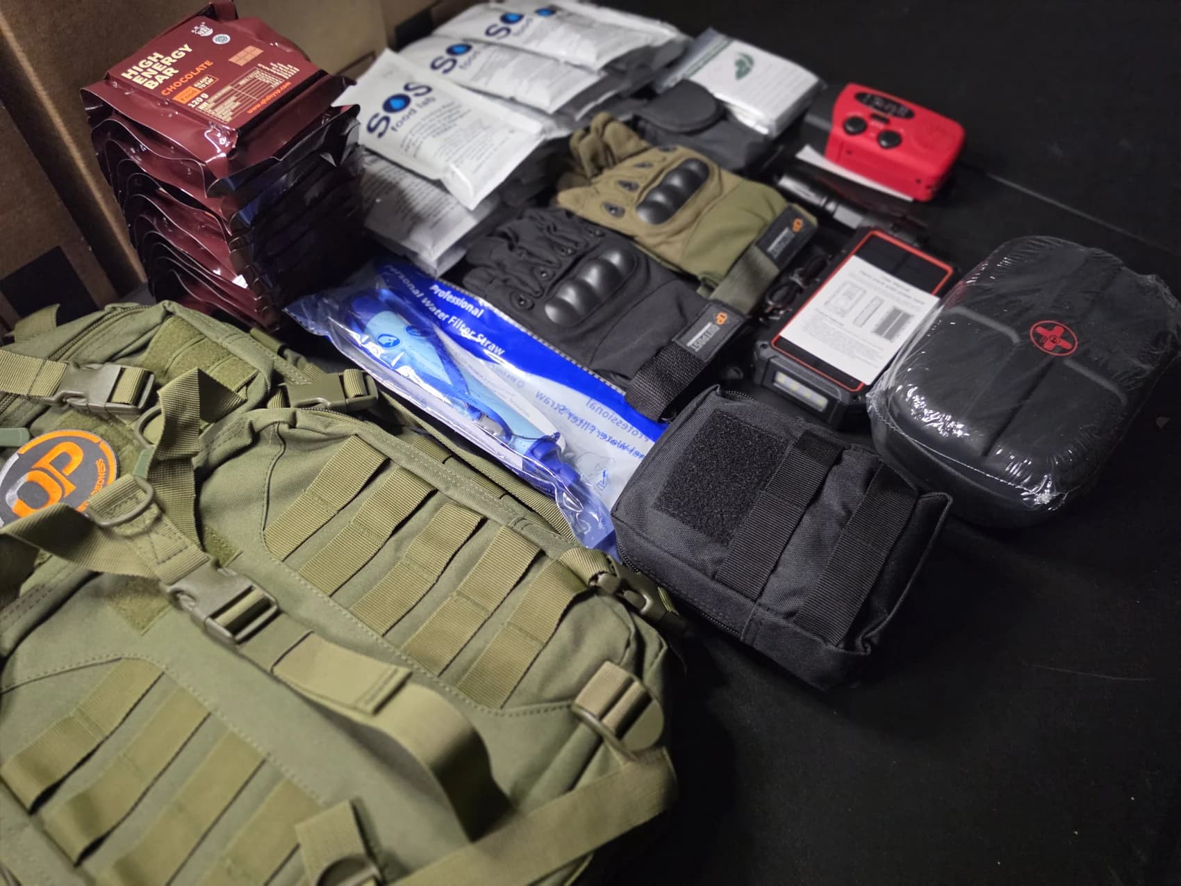 Every component of the Essential+ Go-Bag counted out on the bench